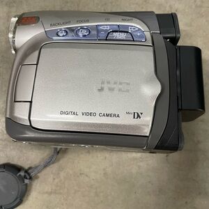 JVC Silver Digital Video Camera with accessories.